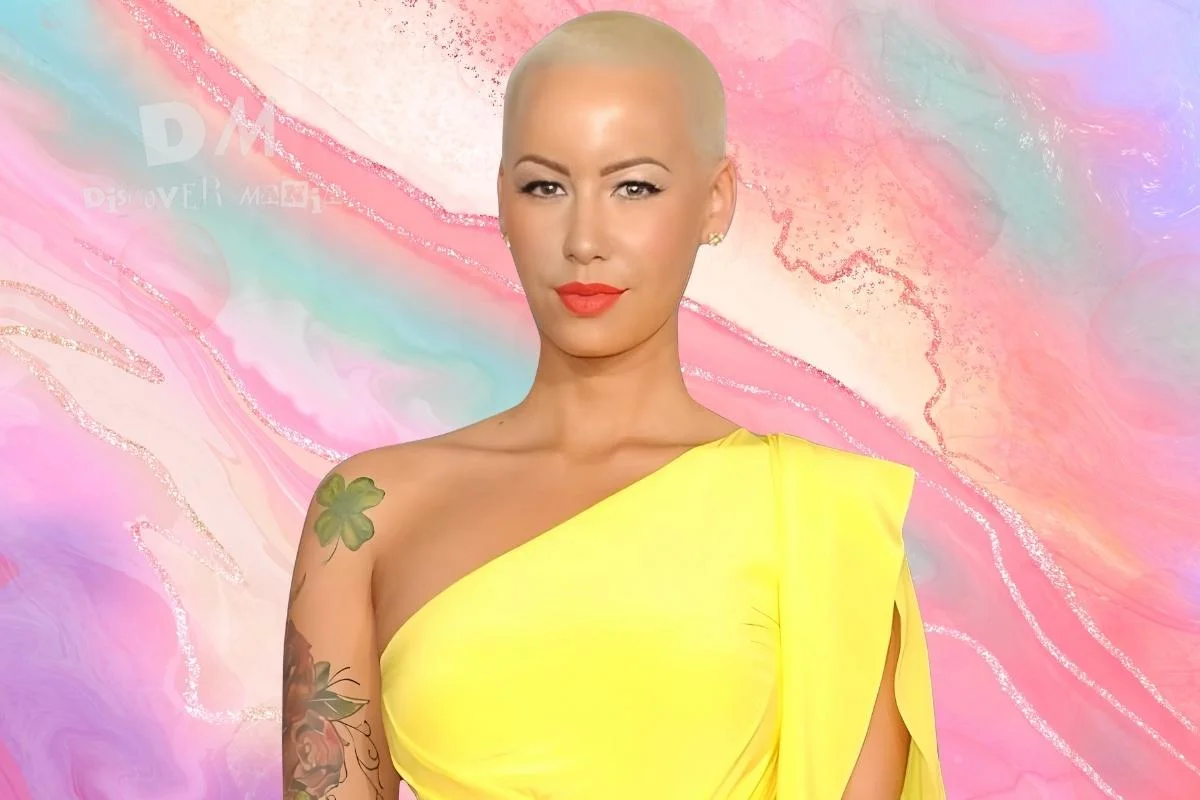 Amber Rose wearing a yellow one-shoulder dress, with a shaved head and bold red lipstick, standing against a colorful pastel background, representing her success and highlighting Amber Rose net worth.